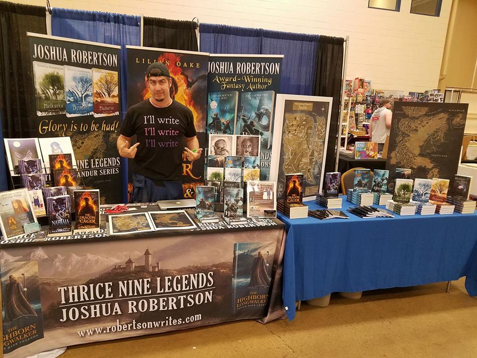 Lilian Oake’s photo of Joshua Robertson standing in their joint booth at the Steel City Con – Pennsylvania’s premier Comic Con! #iCreateDaily